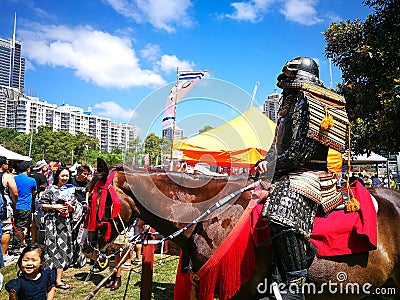 Samurai Armour cosplay on the horse.The image at Matsuri Japanese Festival. Editorial Stock Photo